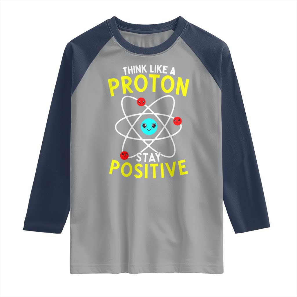 Think Like A Proton Stay Positive Raglan Shirt Funny Science - Wonder Print Shop