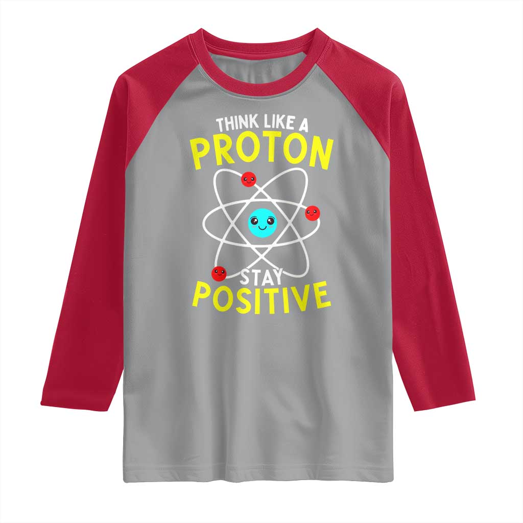 Think Like A Proton Stay Positive Raglan Shirt Funny Science - Wonder Print Shop
