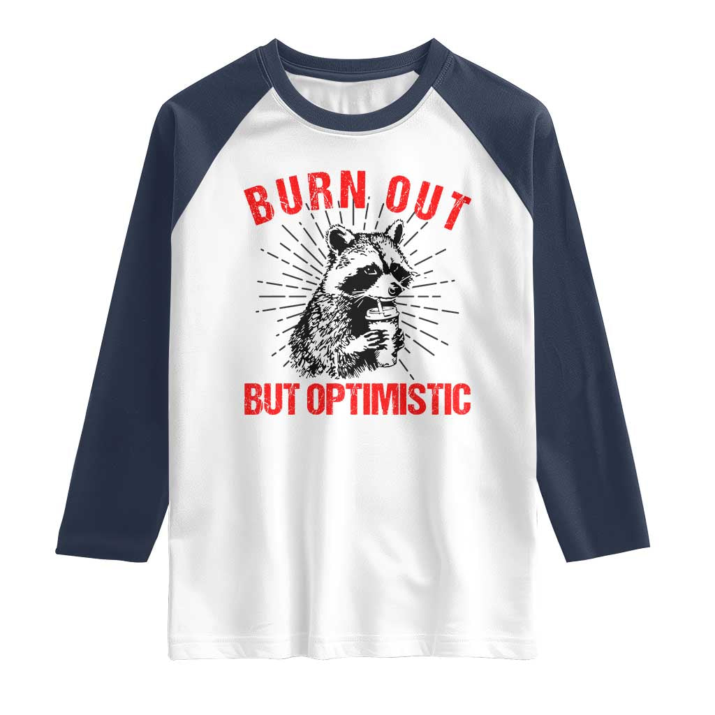 Burnt Out But Optimistic Raglan Shirt Funny Raccoon Meme - Wonder Print Shop