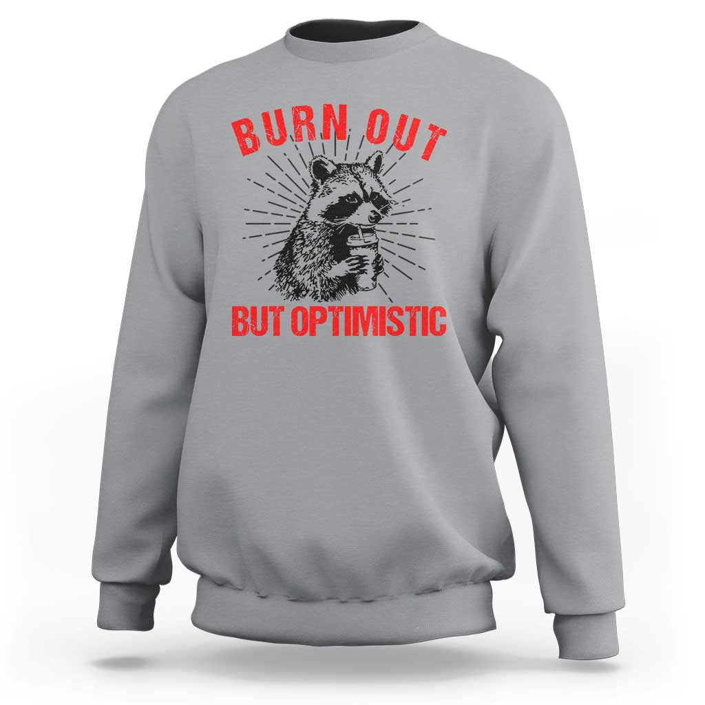 Burnt Out But Optimistic Sweatshirt Funny Raccoon Meme - Wonder Print Shop