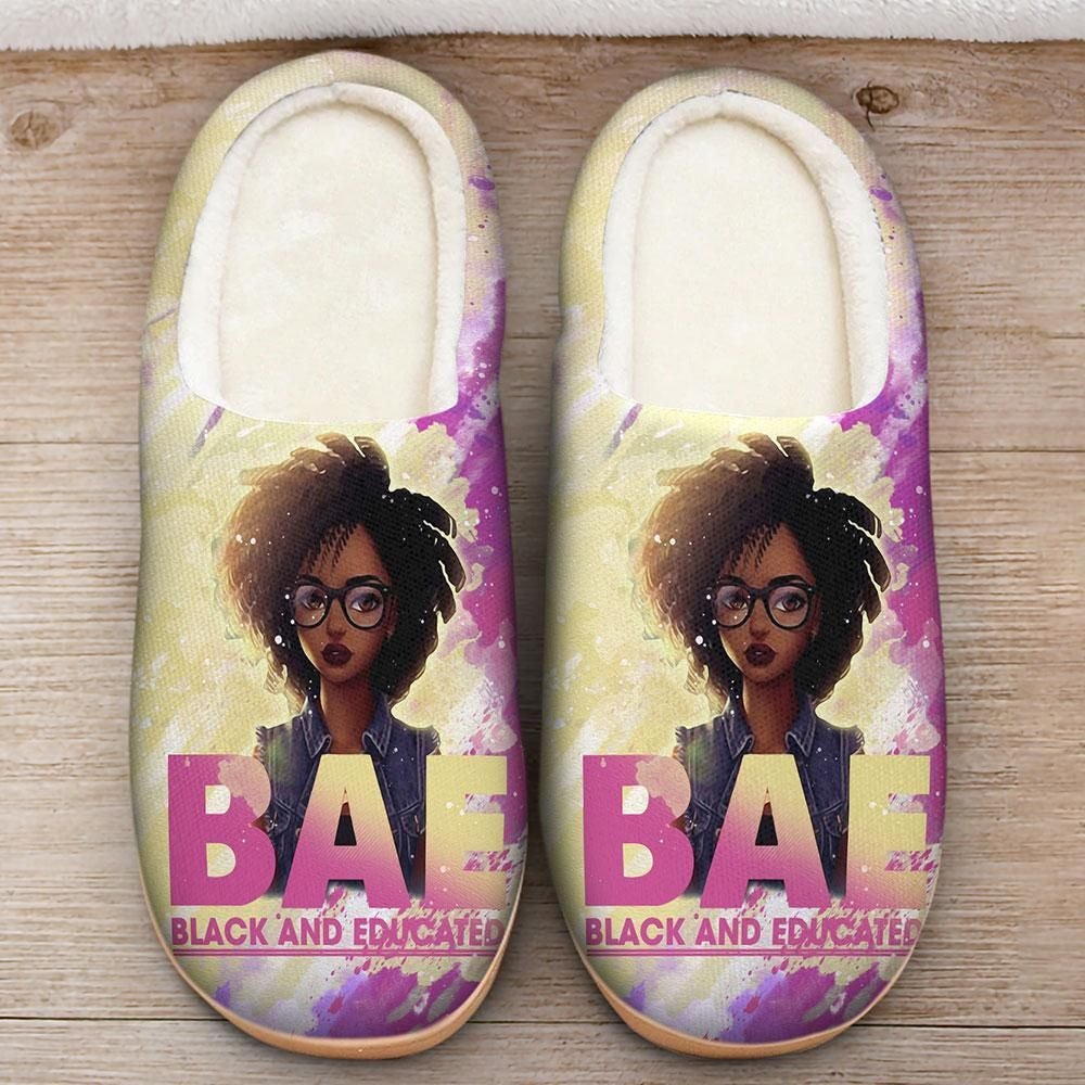 Pair of fleece slippers with illustrated face and bold text: “BAE” and “BLACK AND EDUCATED”