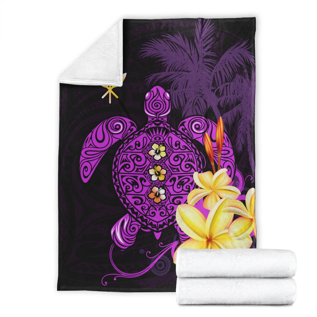 Purple Hawaiian turtle blanket with ornate mandala and plumeria flower, with folded white towels