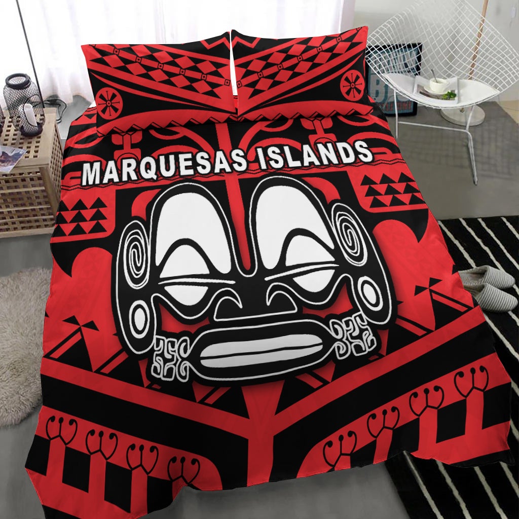 Close view of red and black Marquesas Islands face mask bedding with two pillow tops