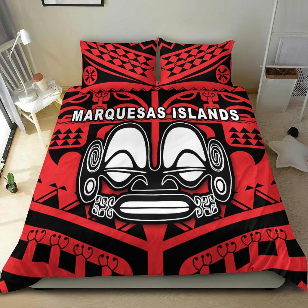 Red and black comforter with Marquesas Islands face mask print and matching pillow shams