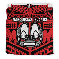 Red and black bedding set with Marquesas Islands face mask design, centered on comforter front