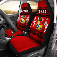 Red and black Tonga patterned car seat covers with TONGA text and crest emblem