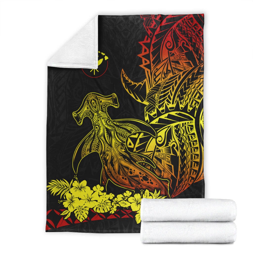 Black Polynesian blanket with hammerhead shark design and yellow tropical flower strip