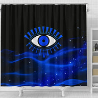 Black shower curtain featuring a blue evil eye emblem over deep blue nebula-style art