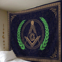 Hanging freemasonry crest tapestry with G emblem and laurel, framed border on dark fabric