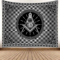 Black tapestry with white Freemasonry crest in a circular medallion and diamond pattern border