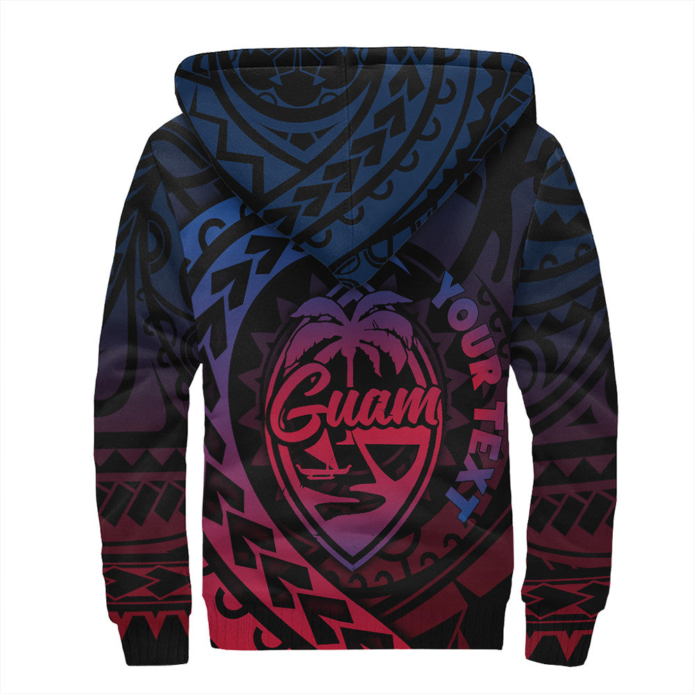 Black pullover hoodie with large Guam face graphic and tribal sleeve pattern
