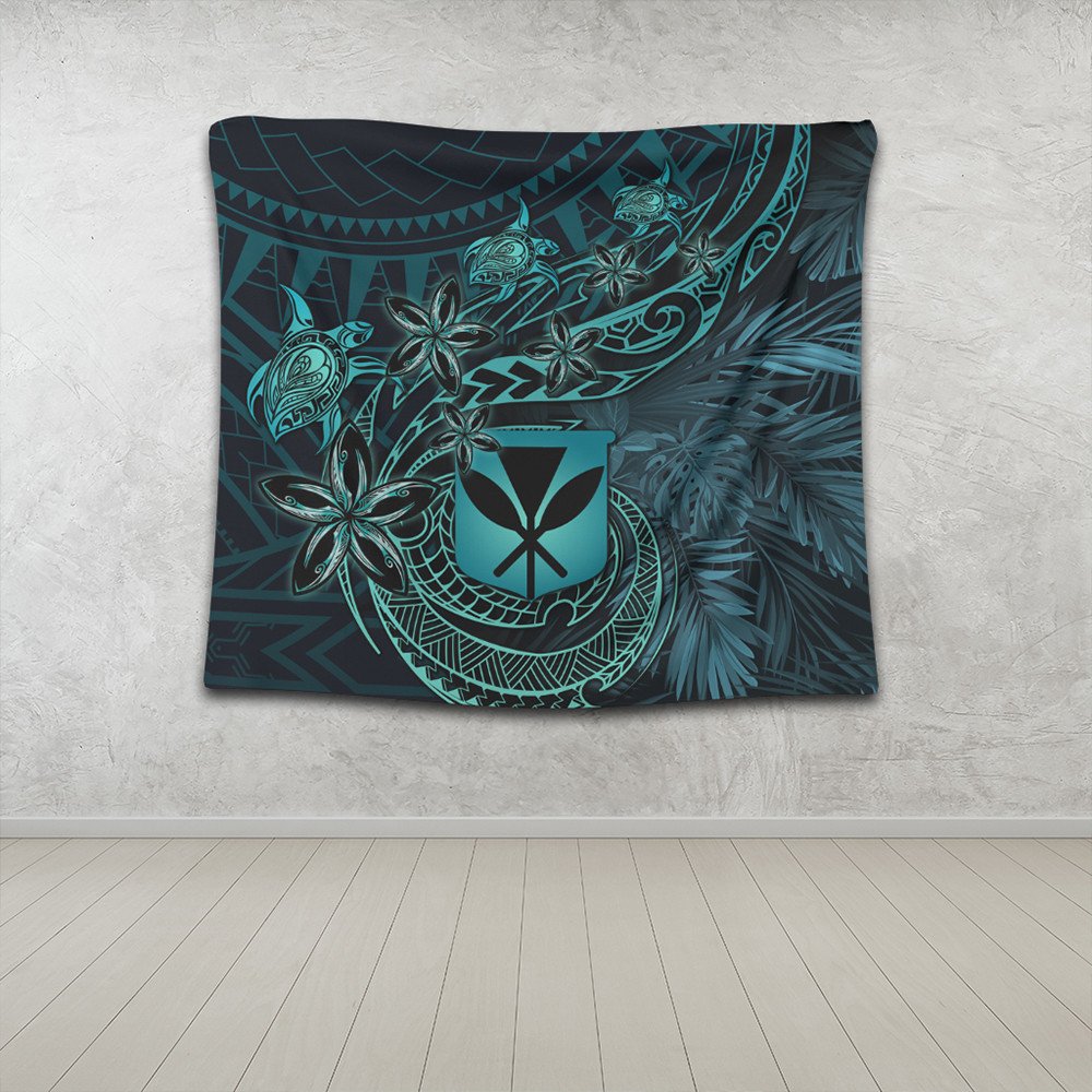 Turquoise honu turtle and tiare flower motifs on dark teal tapestry with leafy pattern