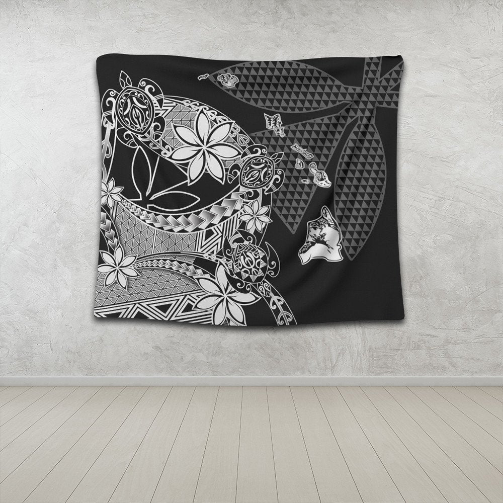 Black Polynesian tapestry wall hanging with white hibiscus-like florals and tribal geometry