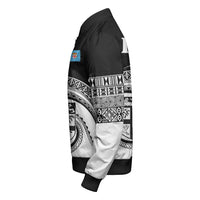 Side view black zip bomber jacket with Polynesian print sleeves and small Fiji crest patch