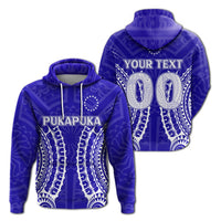 Blue tribal pattern hoodie with Pukapuka front print, hood and drawstrings.