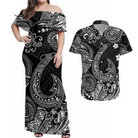Black off-shoulder maxi dress, white Polynesian tribal fish pattern, short sleeves