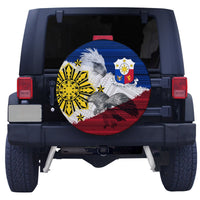 Round spare tire cover featuring Filipino tribal eagle, blue red white and gold artwork