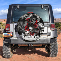 Skull camo spare tire cover with black, white and red graphic skulls, viewed from rear