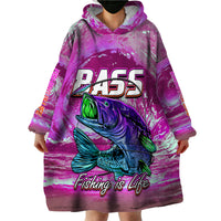 Wearable blanket hoodie worn, pink and purple with large bass graphic and hooded neckline