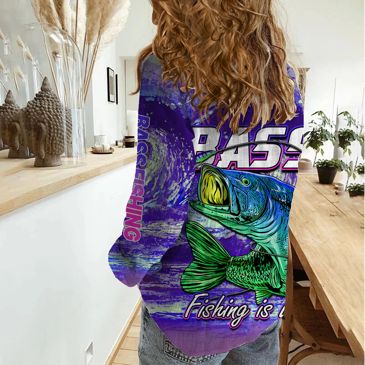 Purple women casual shirt with bass fish graphic and 'Fishing is' text on back