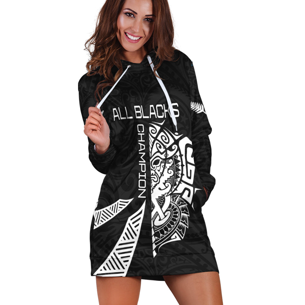 Black hoodie dress with white 'ALL BLACK' and Haka graphic on front panel, pullover