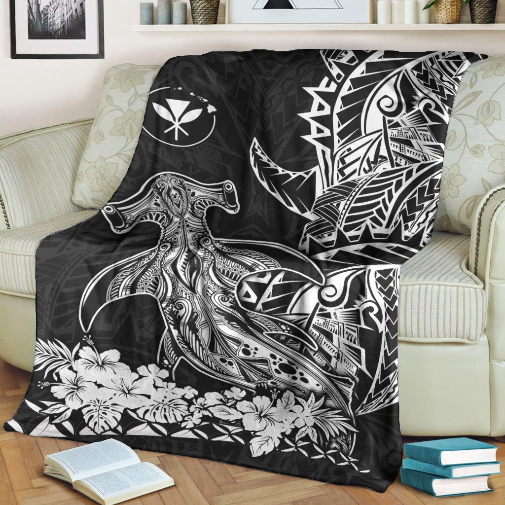 Black and white hammerhead shark throw blanket with floral border on sofa