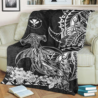 Black and white hammerhead shark throw blanket with floral border on sofa