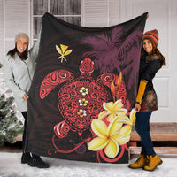Hawaiian throw blanket featuring a turtle graphic, red swirls, and hibiscus flowers on dark fabric