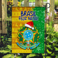 Brazil Feliz Natal! house flag with Santa hat and crest, on metal garden stand.
