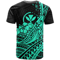 Turquoise whale and hibiscus tribal graphic on black crewneck T-shirt, side view