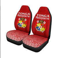 Pair of red Tonga 676 front seat covers with crest and red geometric cushion
