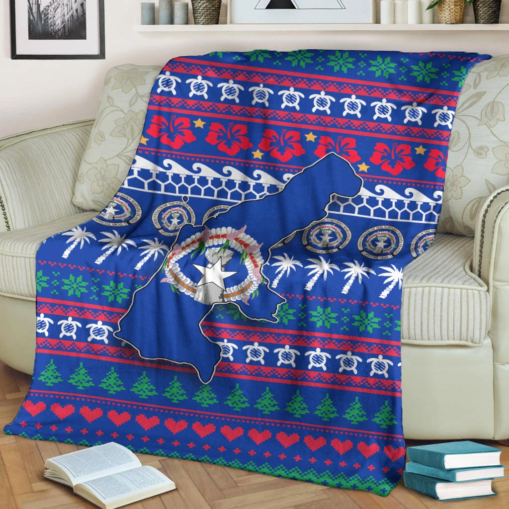 Blue ugly Christmas blanket featuring North Mariana Islands map, wreath badge, red floral pattern