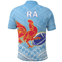 Light blue rugby polo back with RA text and tapa pattern, rooster over rugby ball
