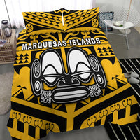 Yellow and black duvet with large tiki face graphic and tribal patterns, with matching pillows