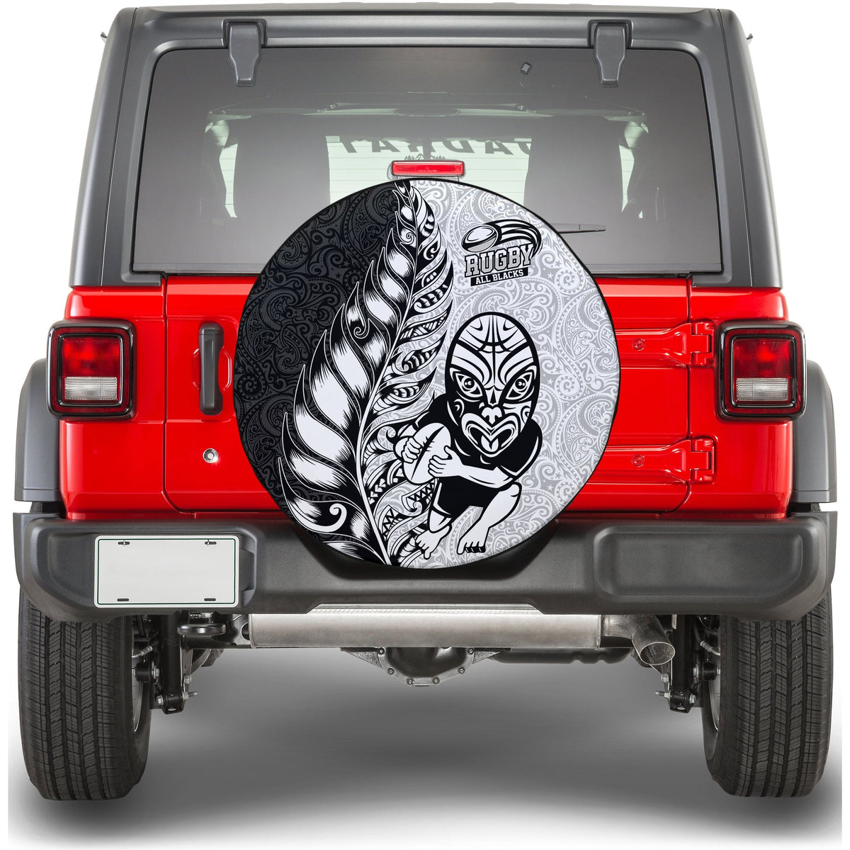 Spare tire cover with circular Maori-style rugby emblem in black and white