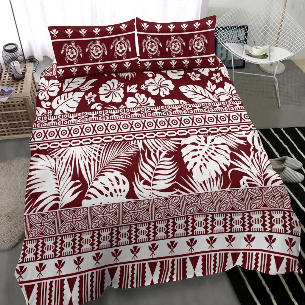 Red and white duvet cover with palm, floral, and tribal stripe patterns across panels