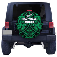 Spare tire cover, circular black base with green New Zealand Rugby Maori design