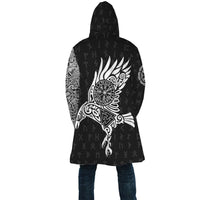 Black hooded cloak back view with oversized white raven tattoo and rune symbols