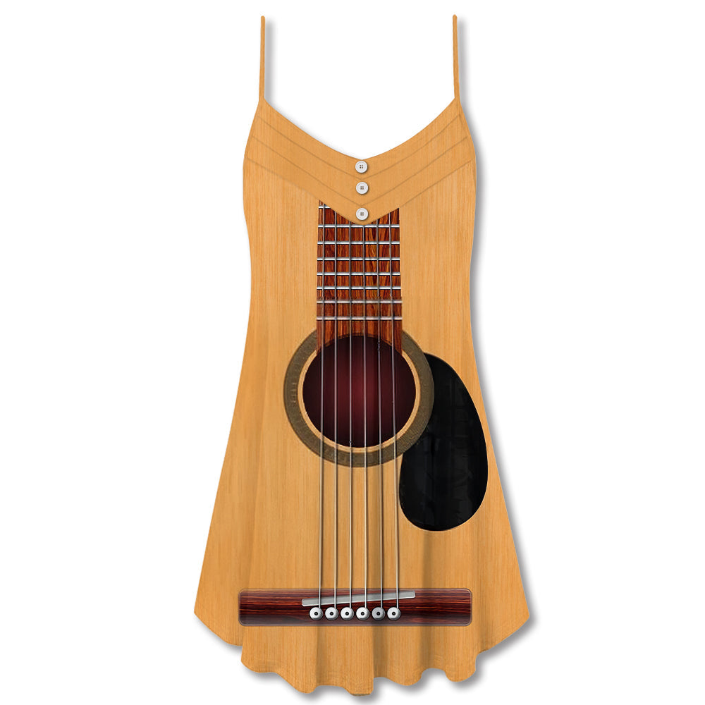 Yellow cami dress front view, V-neck button placket with large guitar graphic