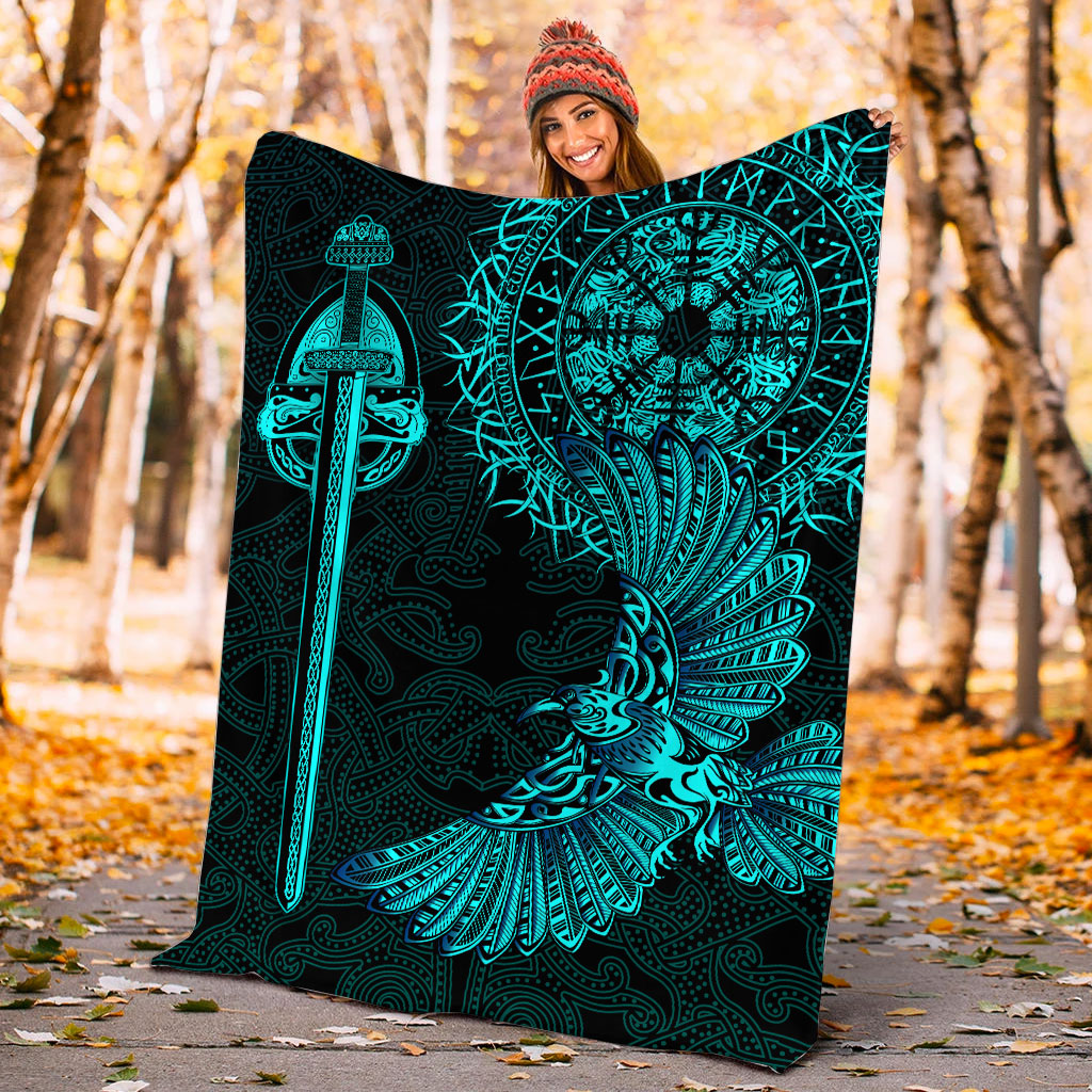 Black outdoor blanket with teal Viking raven tattoo art, sword and winged raven graphic