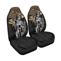 Black bucket-style seat covers with gold patterned backs and Kamehameha warrior graphic