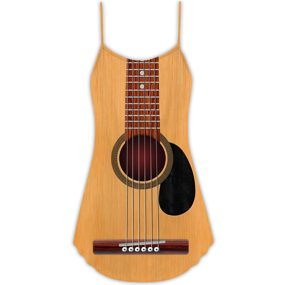 Yellow cami dress with thin straps and guitar graphic on the bodice