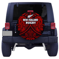 Black spare tire cover with red New Zealand Rugby crest and white fern Maori design
