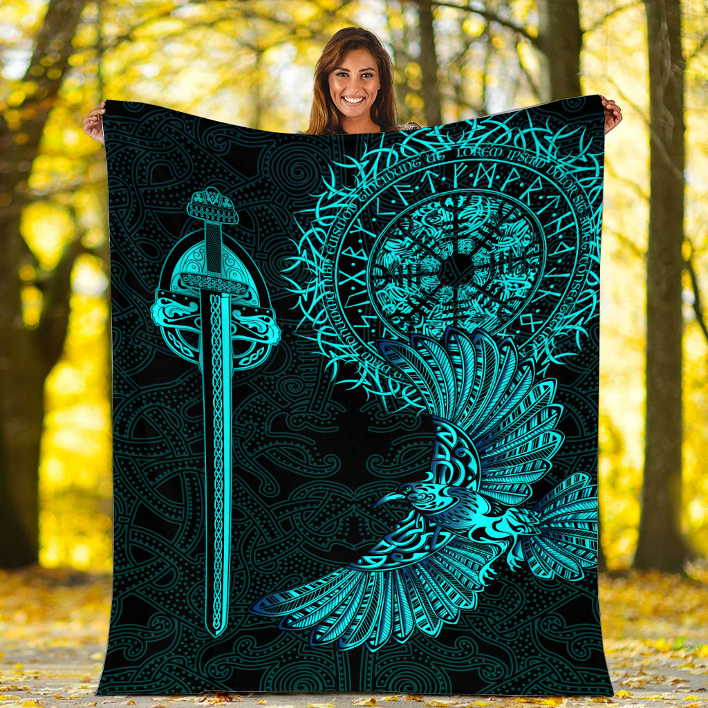 Black blanket held up, teal Viking raven tattoo emblem with sword and wing motif
