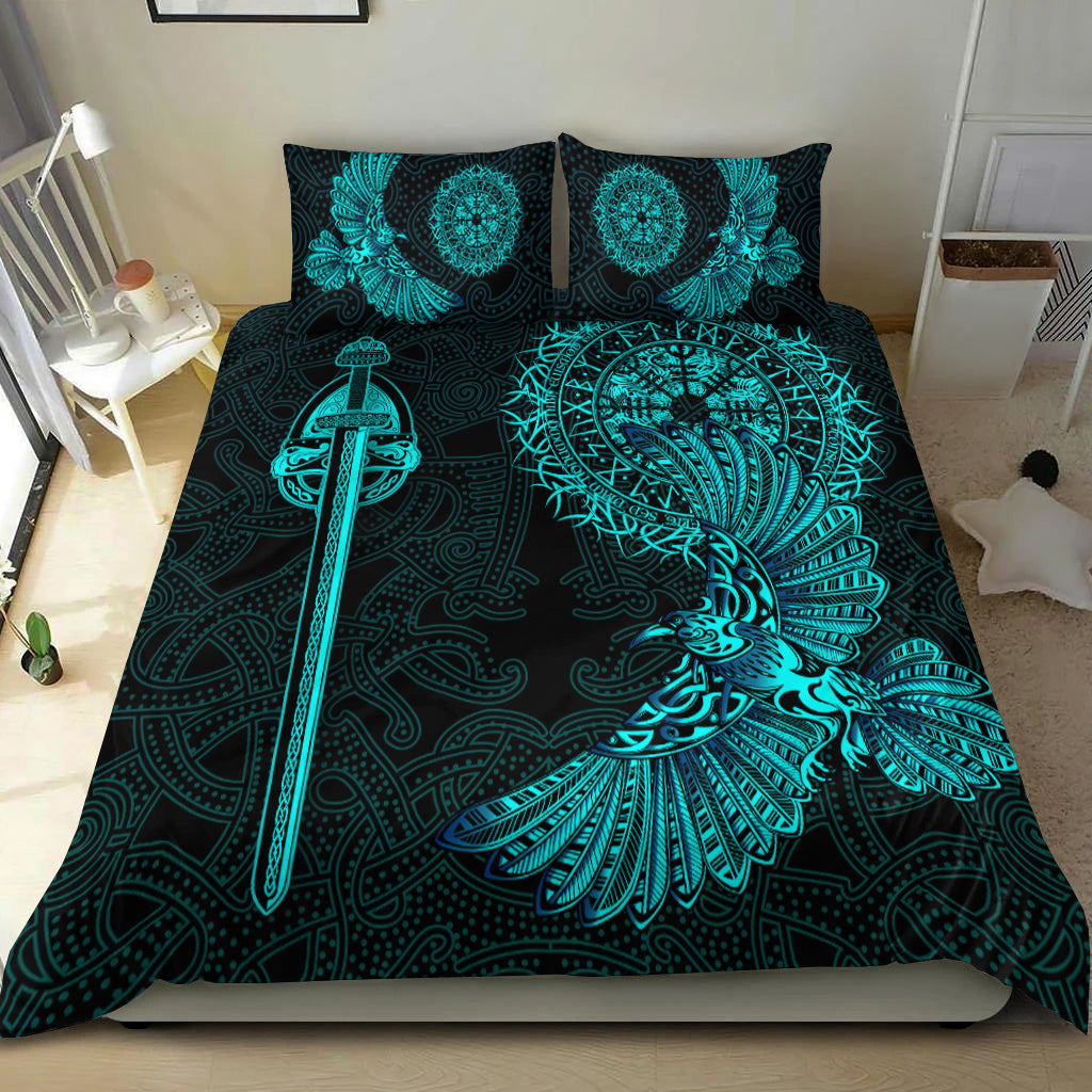 Black duvet cover set with teal raven wing and sword artwork on bed