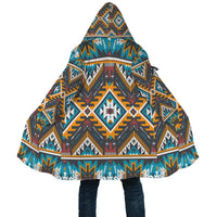 Front/back pattern details on multicolor aztec geometric hooded cloak with draw tie