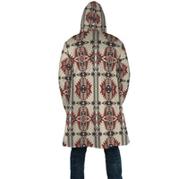 Back view of geometric hooded cloak, multicolor repeating pattern, long drape