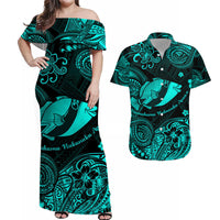 Off-shoulder maxi dress, black with turquoise humuhumu fish and Polynesian motifs