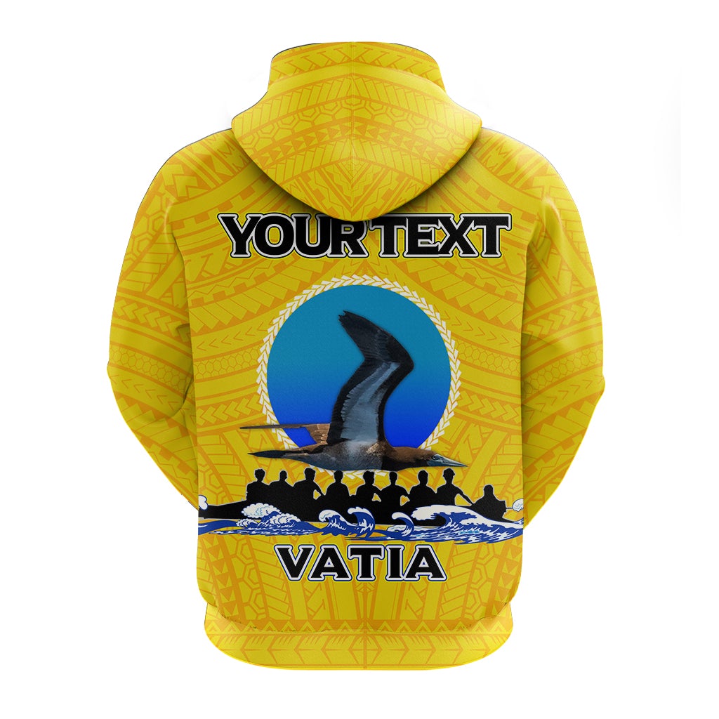 Yellow hoodie back view with YOURTEXT and VATIA logo, blue shark/ship art