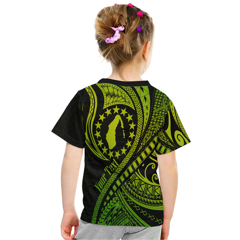 Kids green and black T-shirt, back view, with circular emblem and tribal wave pattern